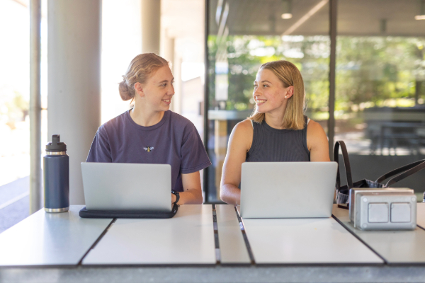 Female university students studying together