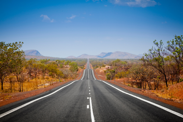 A straight road in the middle of the outback.