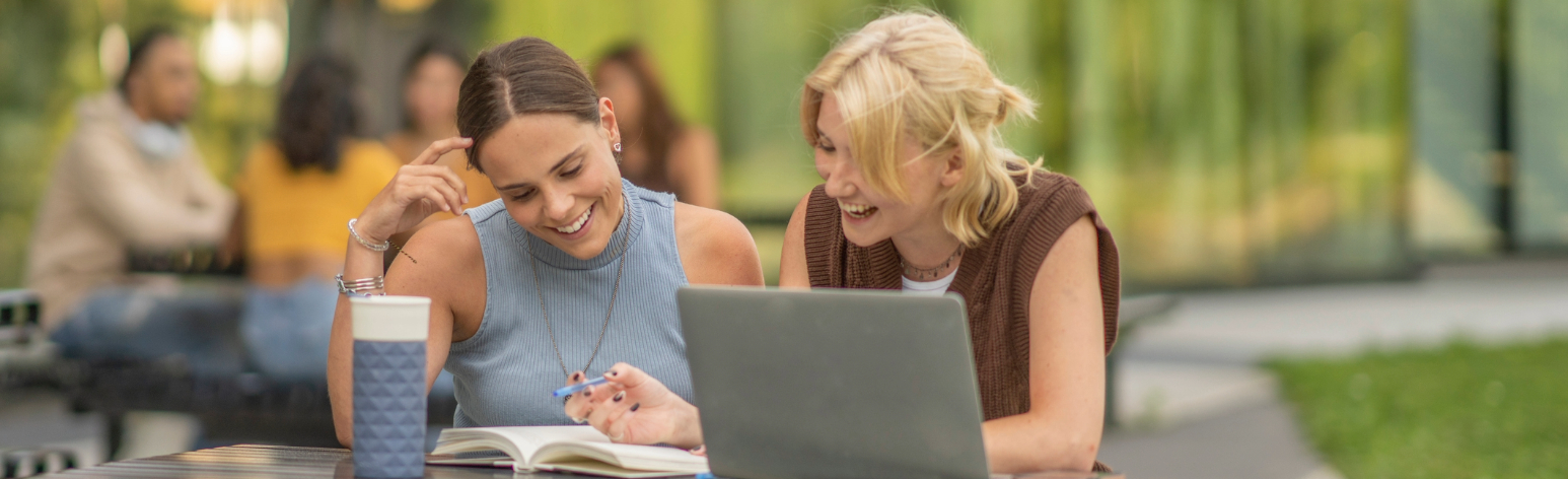 Female university students studying together